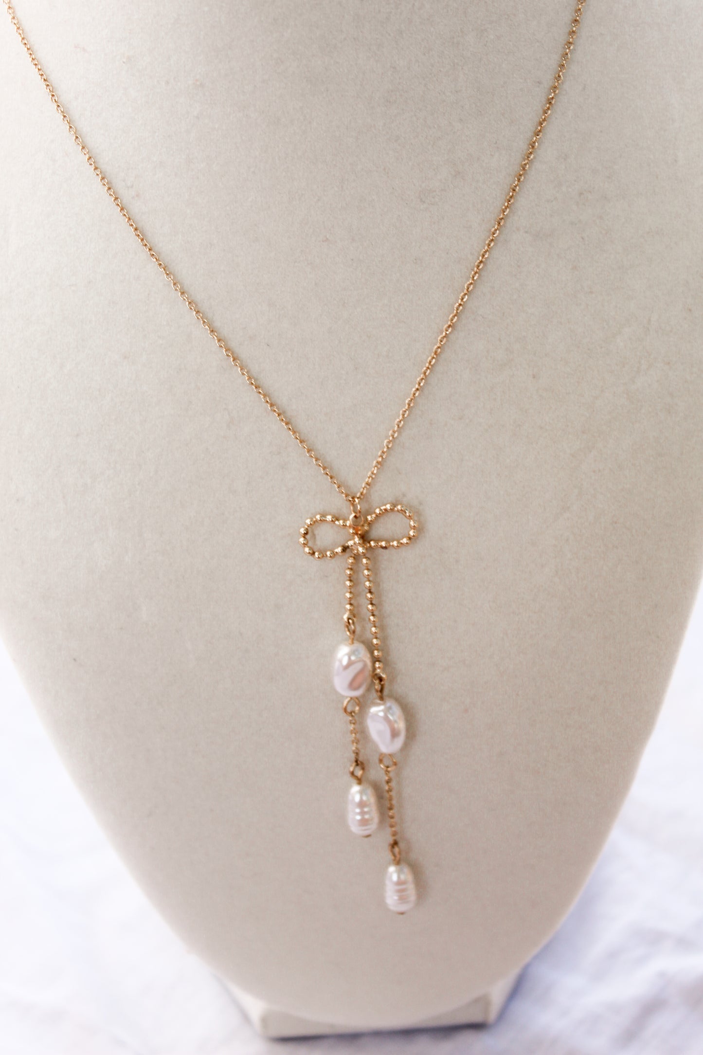 Gold and Pearl Bow Necklace